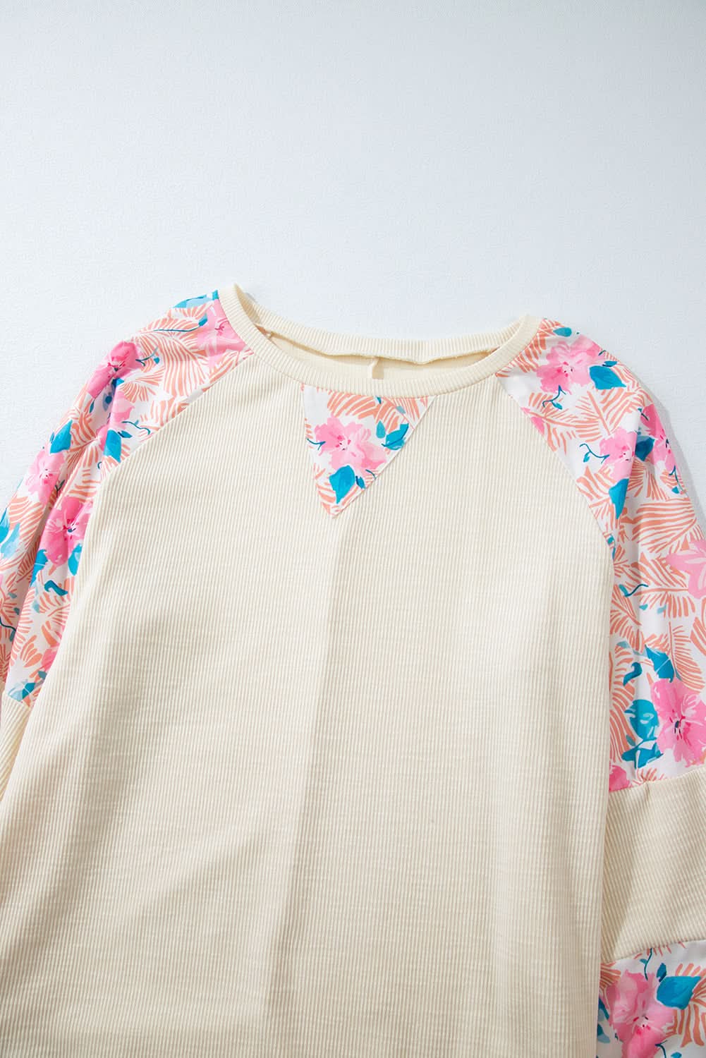 Plus-size apricot floral top