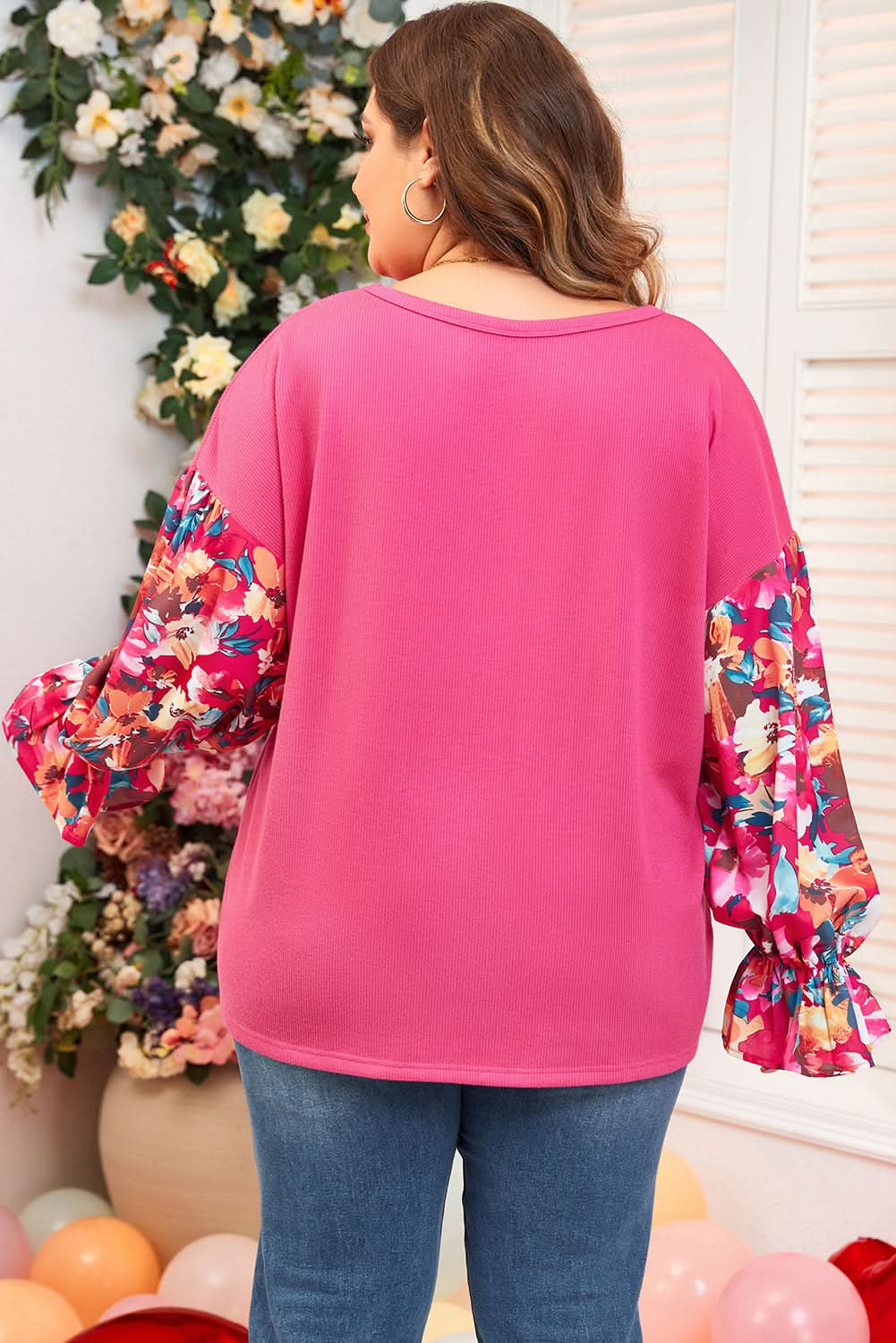 Bright pink plus-size floral top