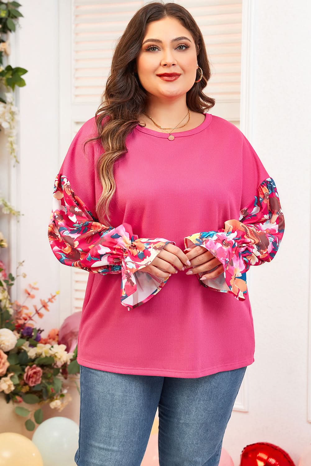 Bright pink plus-size floral top