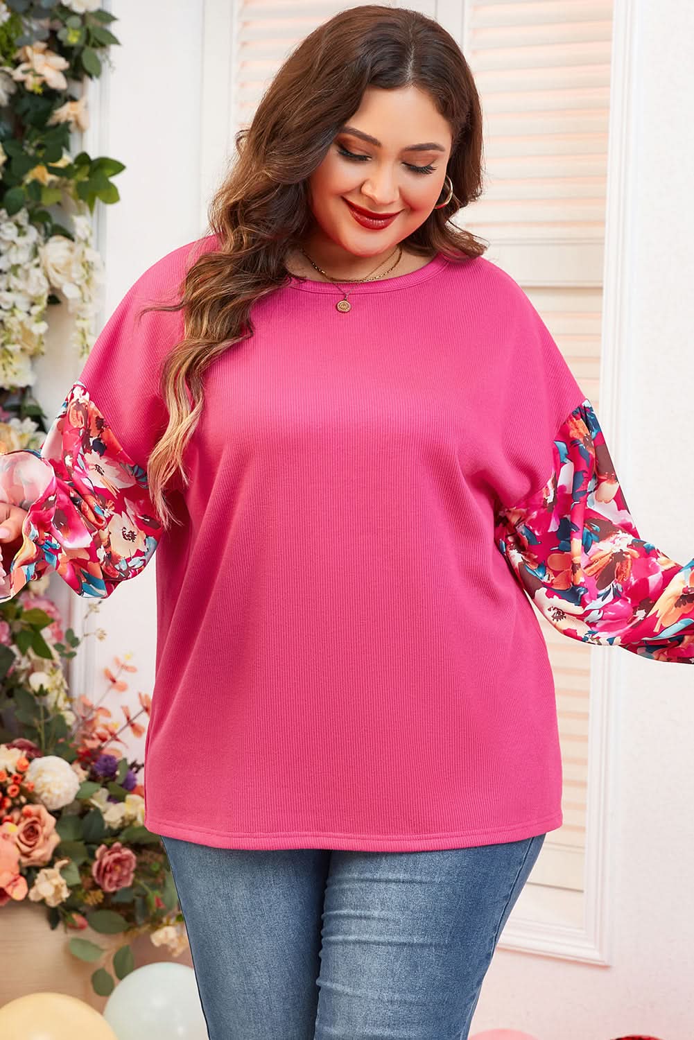 Bright pink plus-size floral top