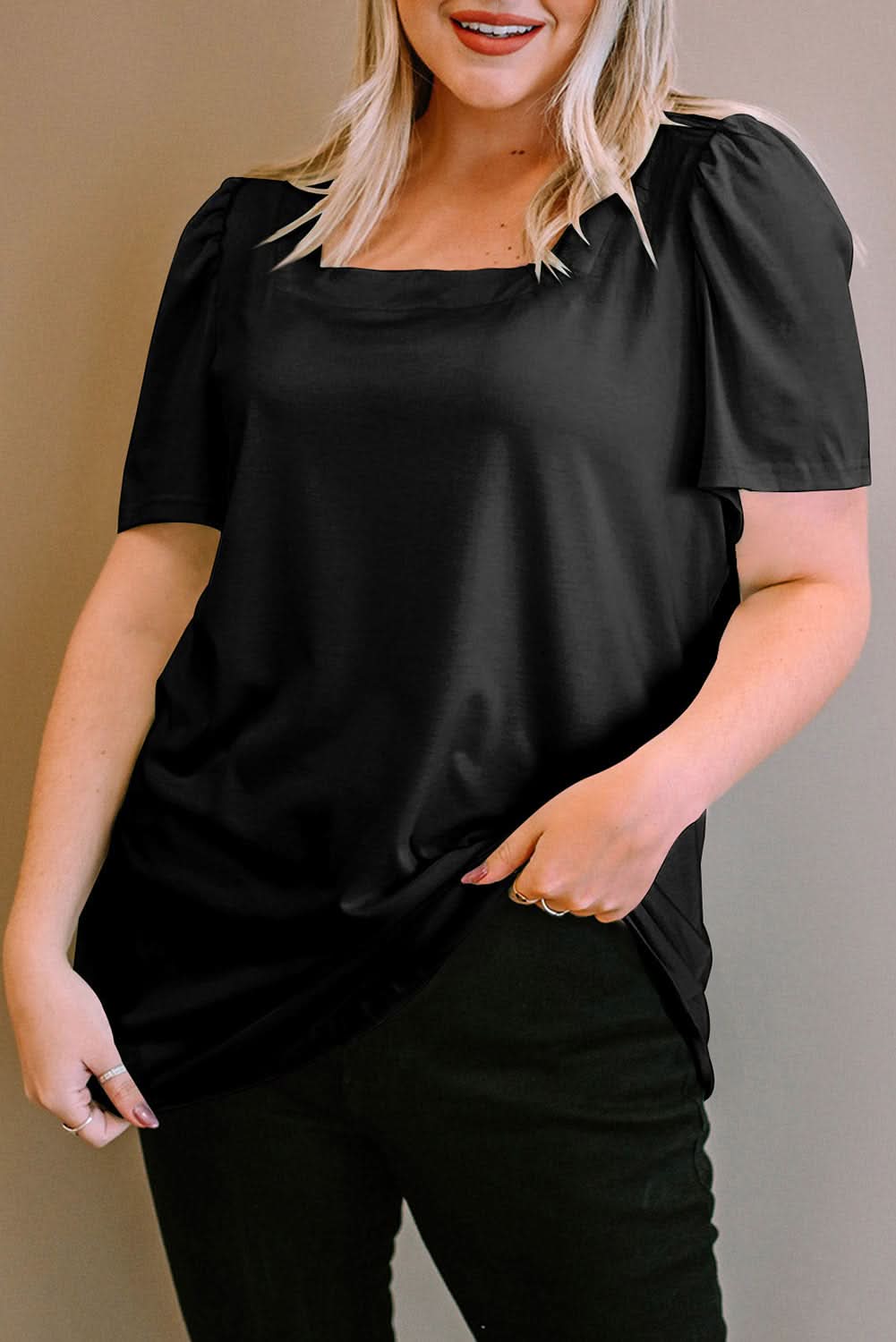 Chic black plus size top with ruching