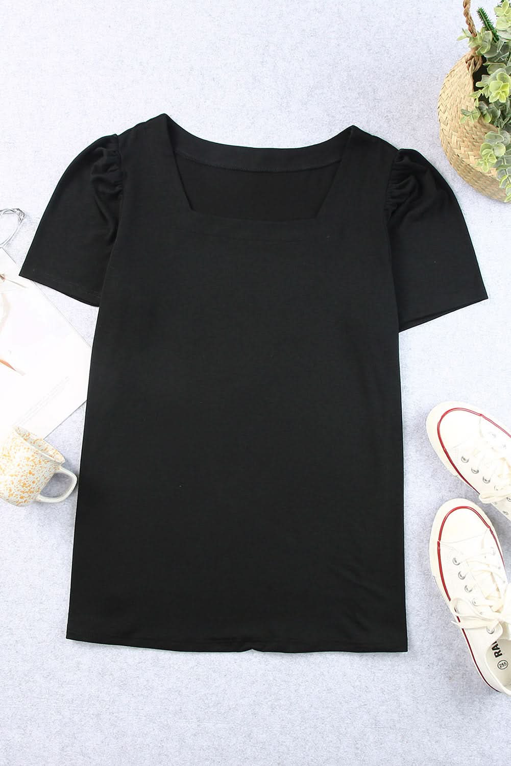 Chic black plus size top with ruching
