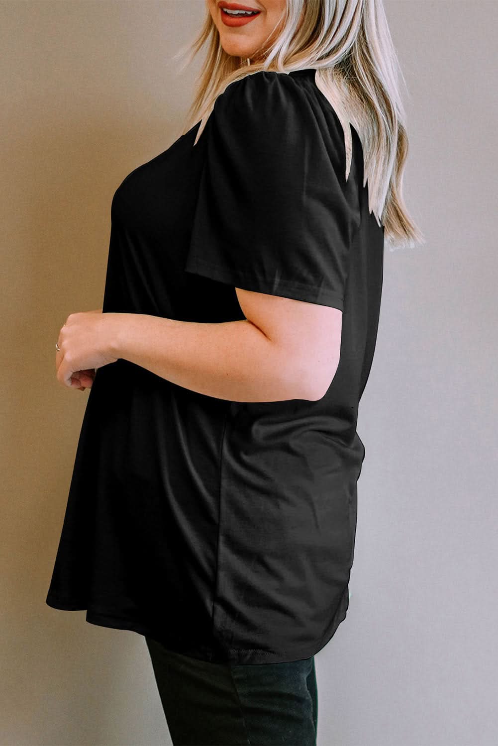 Chic black plus size top with ruching