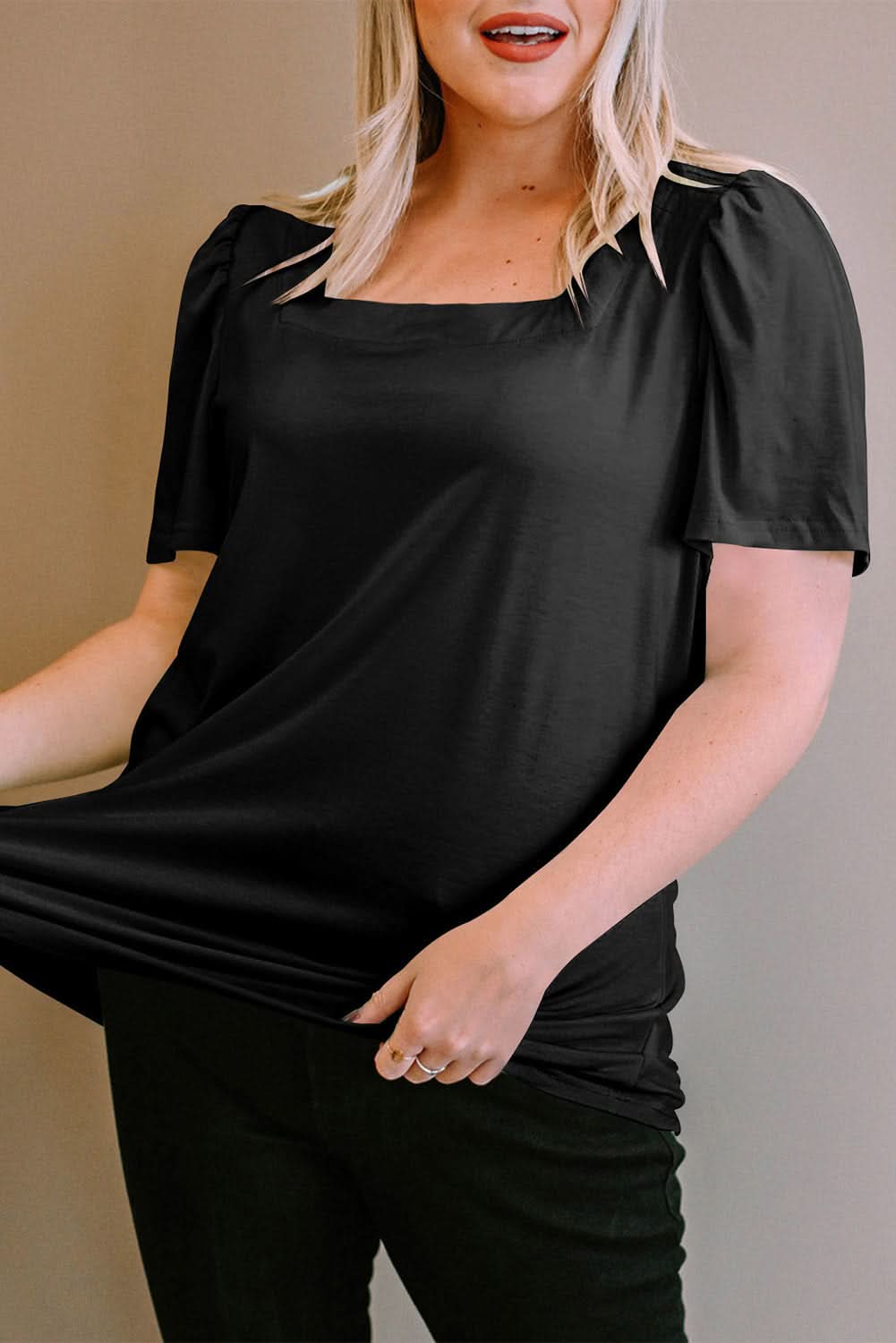 Chic black plus size top with ruching