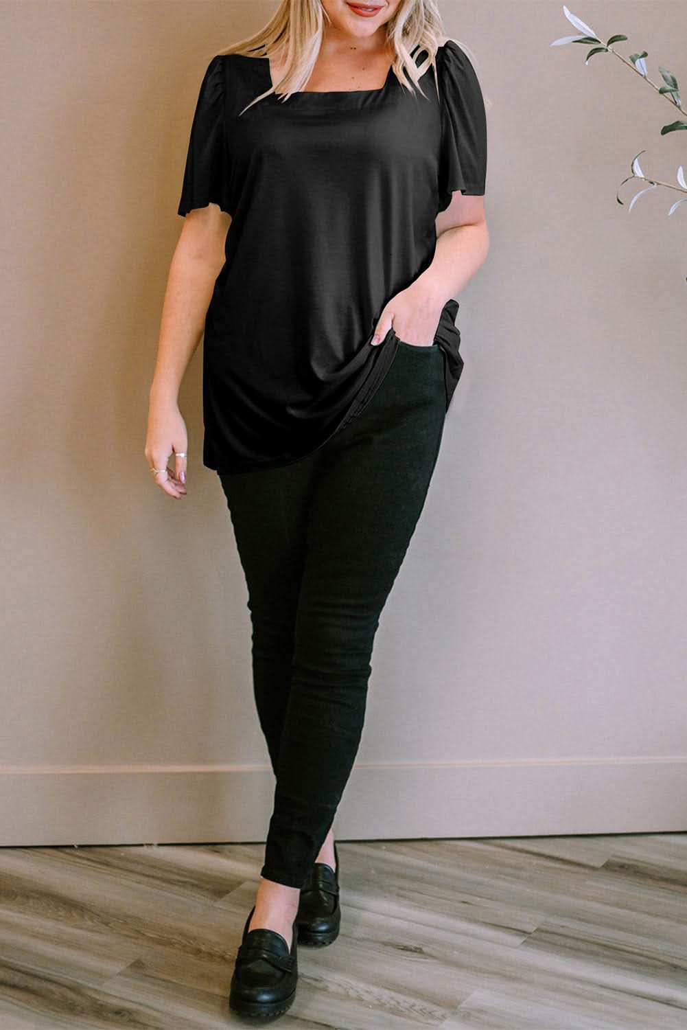 Chic black plus size top with ruching
