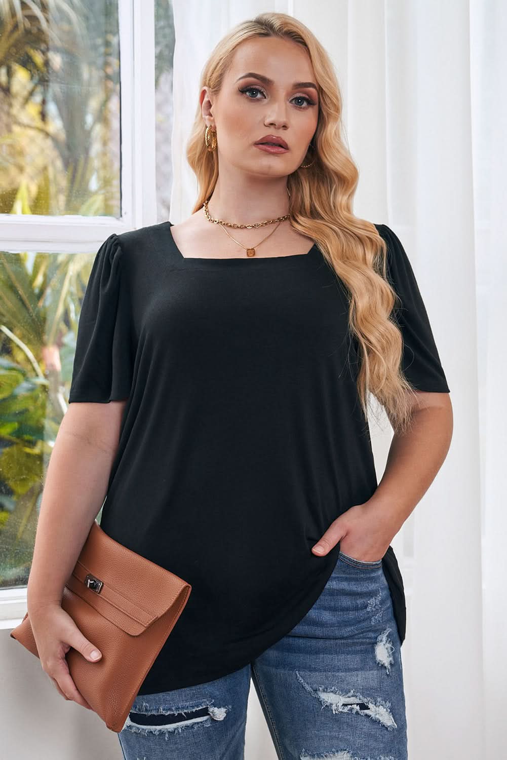 Chic black plus size top with ruching
