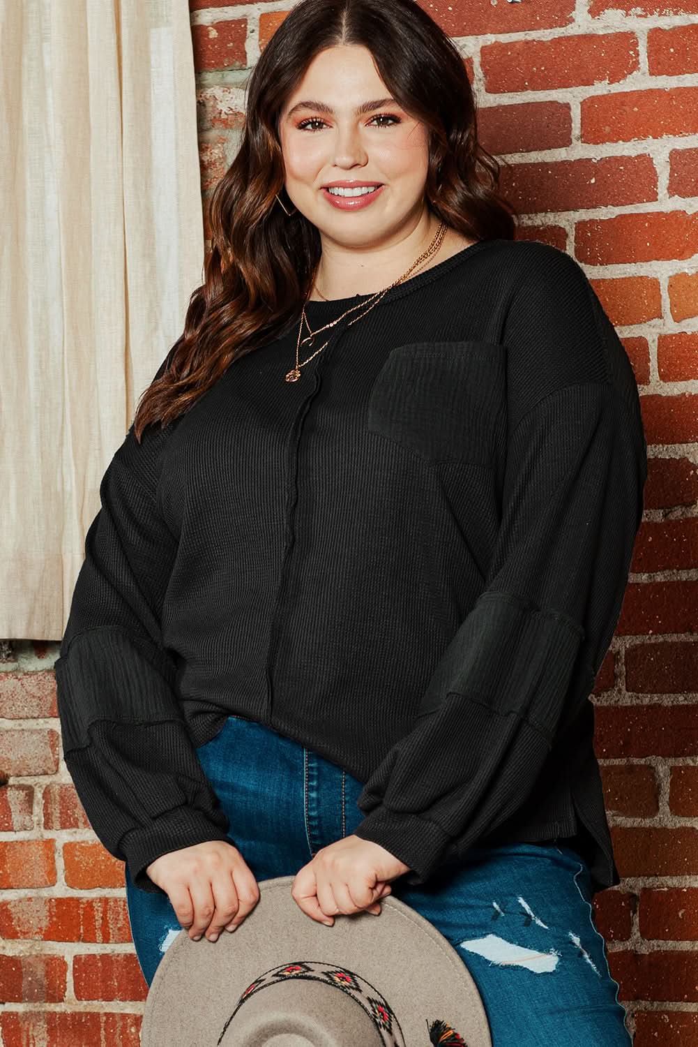 Chic plus-size black crinkle top