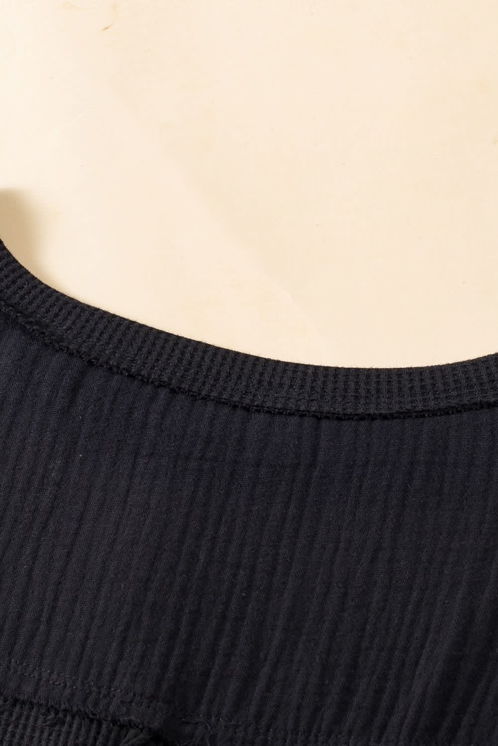 Chic plus-size black crinkle top