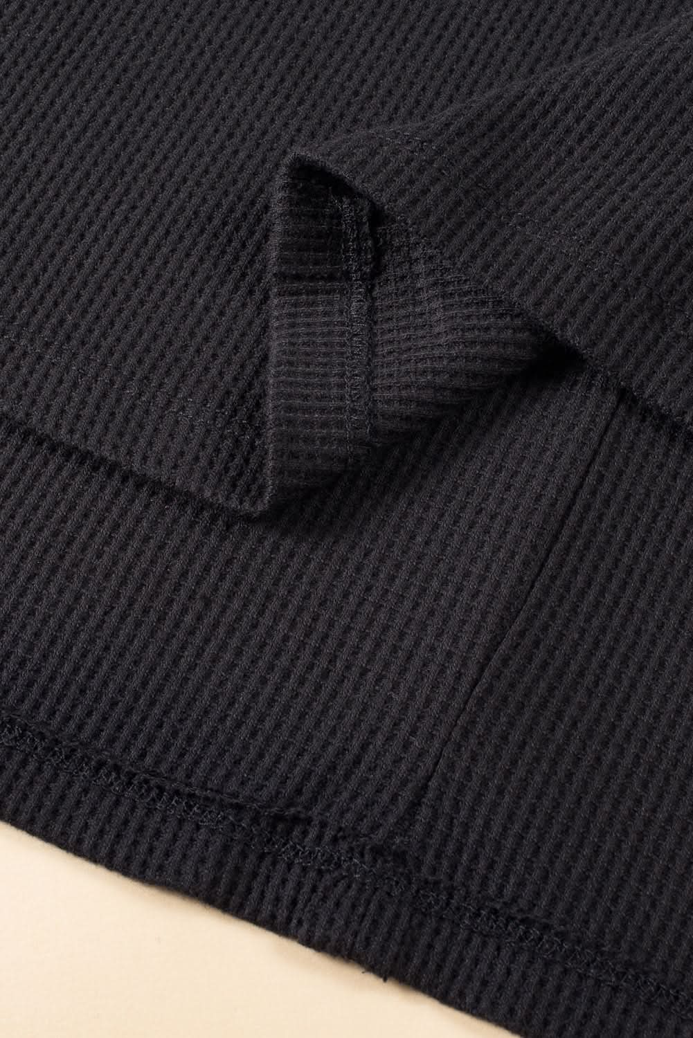 Chic plus-size black crinkle top