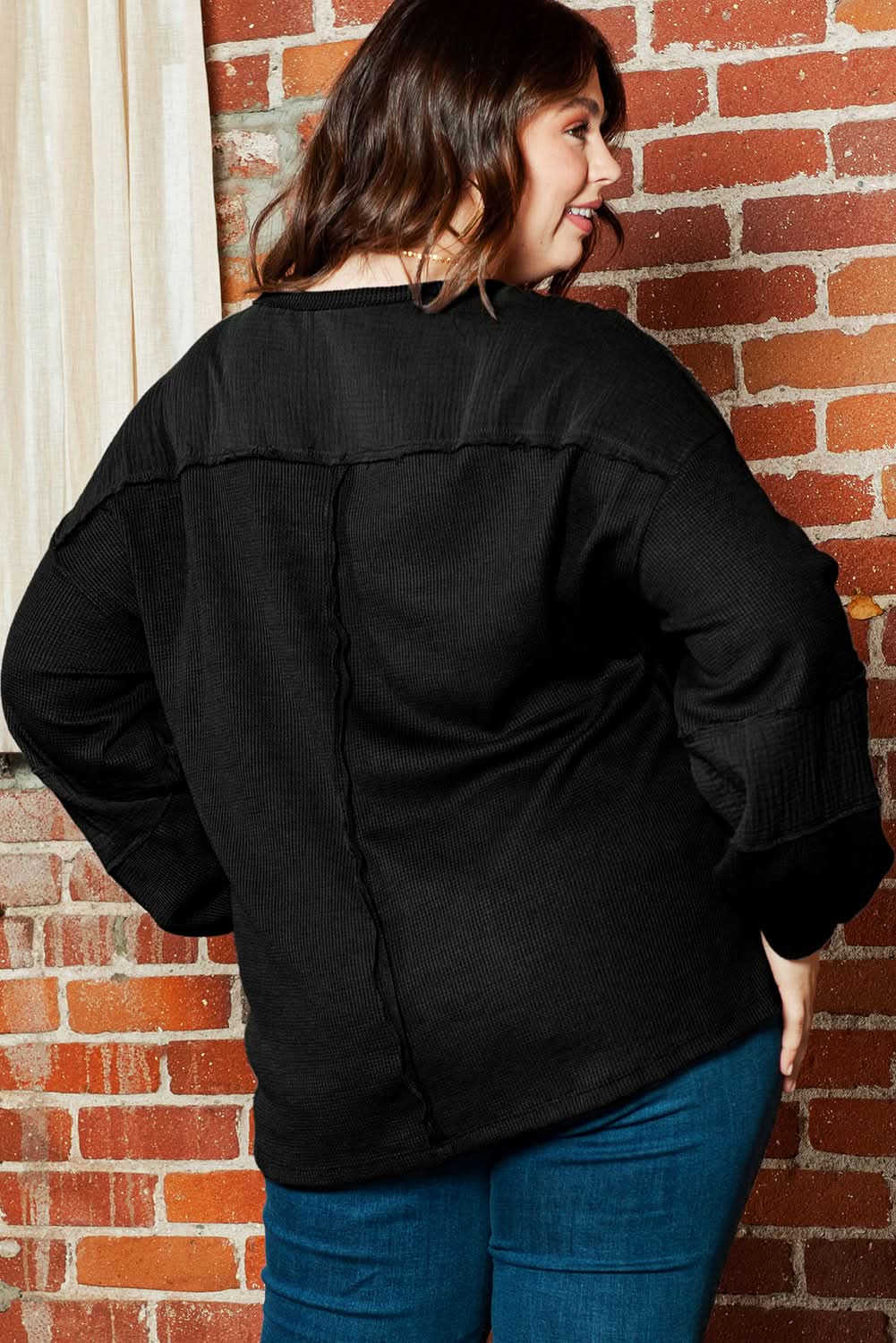 Chic plus-size black crinkle top