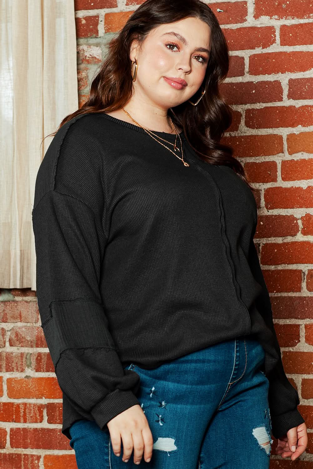 Chic plus-size black crinkle top