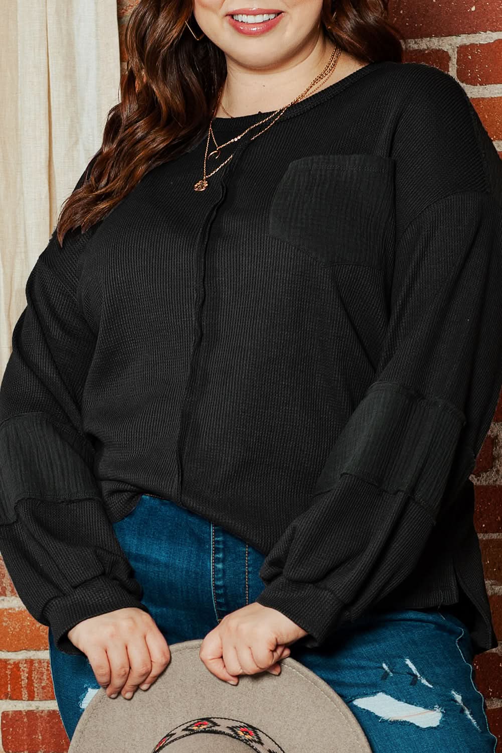 Chic plus-size black crinkle top