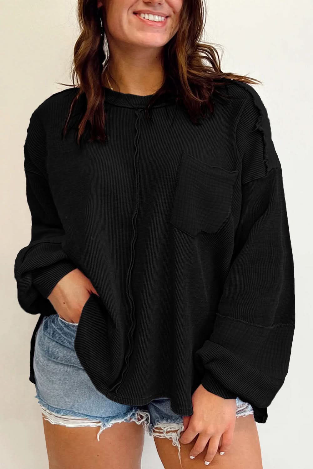 Chic plus-size black crinkle top