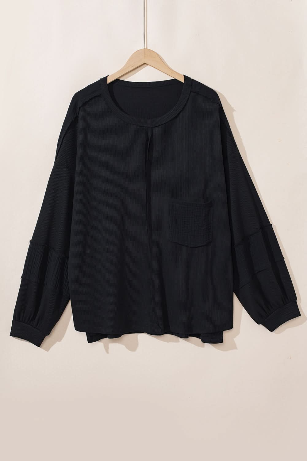 Chic plus-size black crinkle top