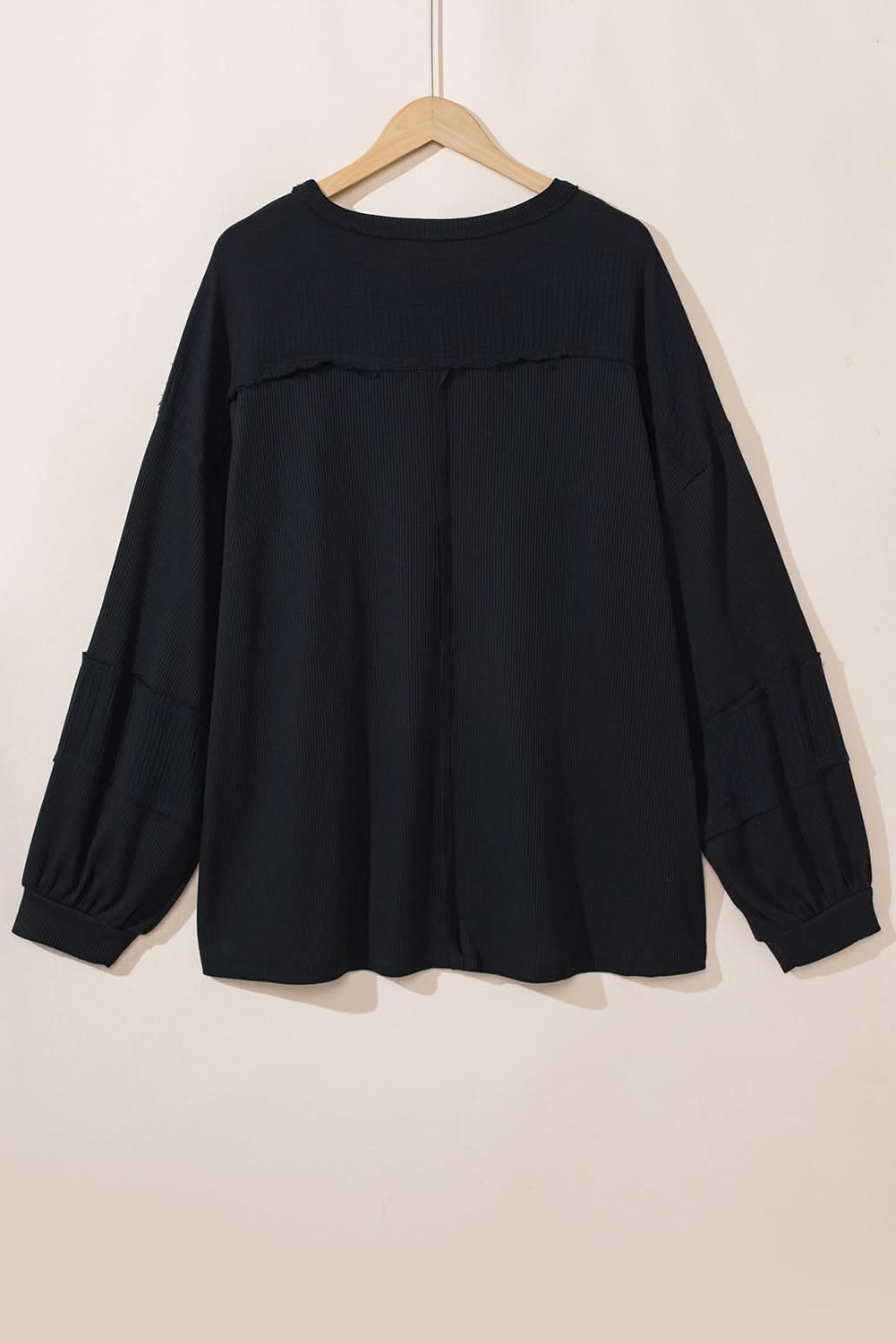 Chic plus-size black crinkle top