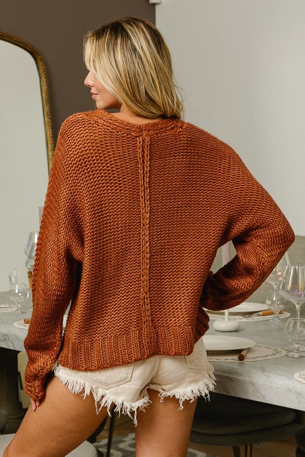 Chic v-neck cable knit sweater for winter elegance