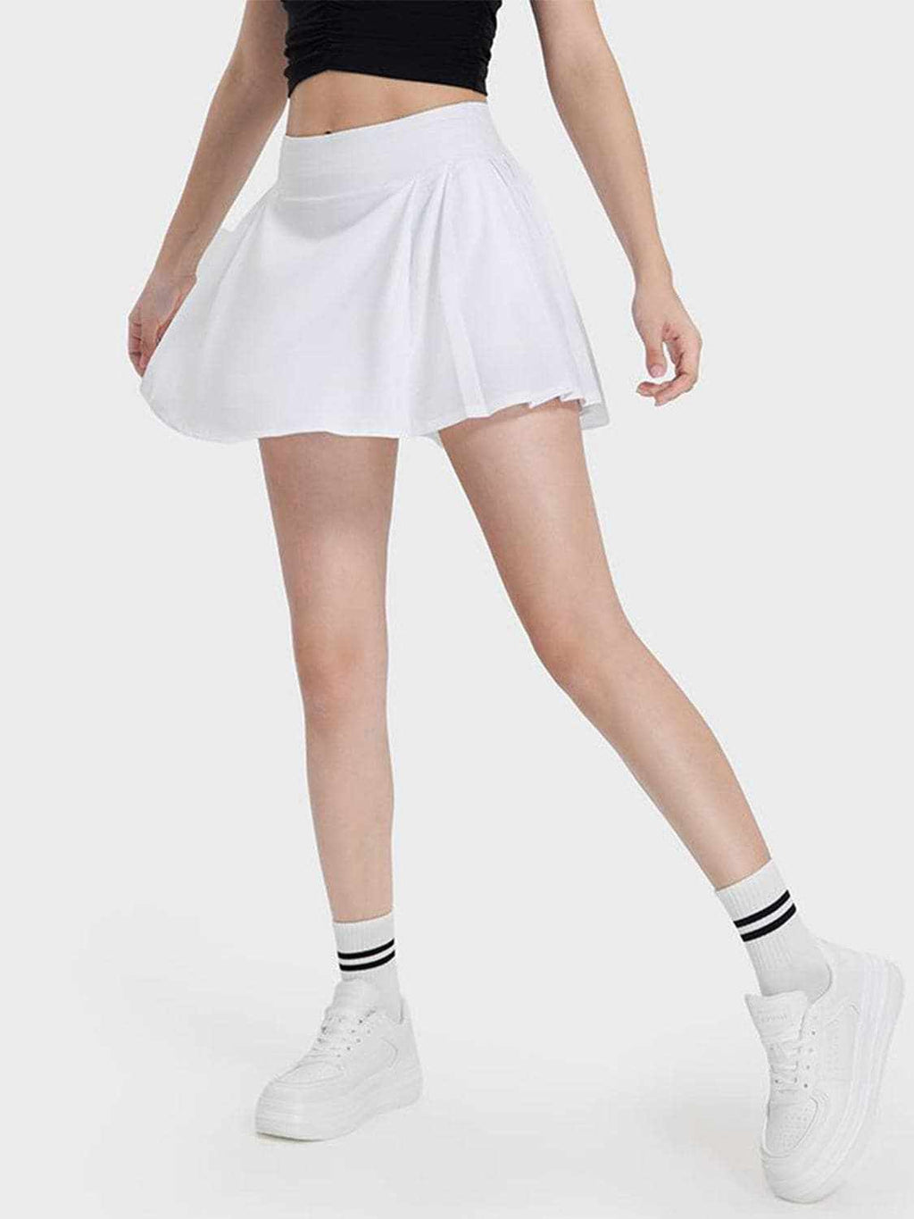 Mid-rise pleated active skirt