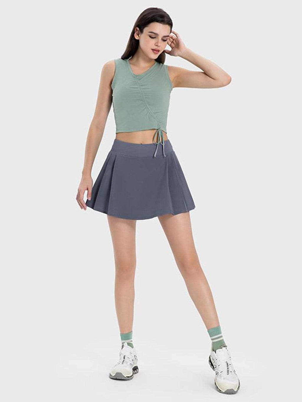 Mid-rise pleated active skirt