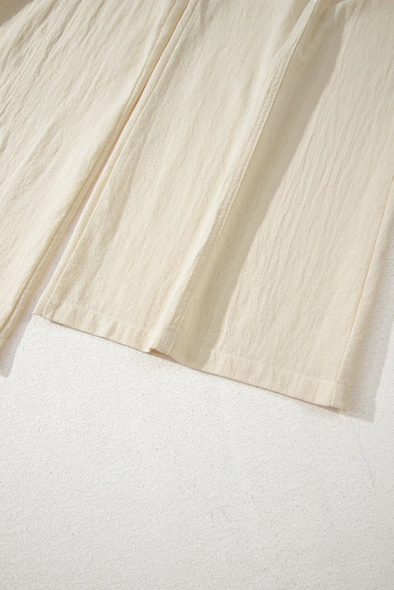 Beige Sleeveless Wide Leg Jumpsuit with Ruched High Waist Design