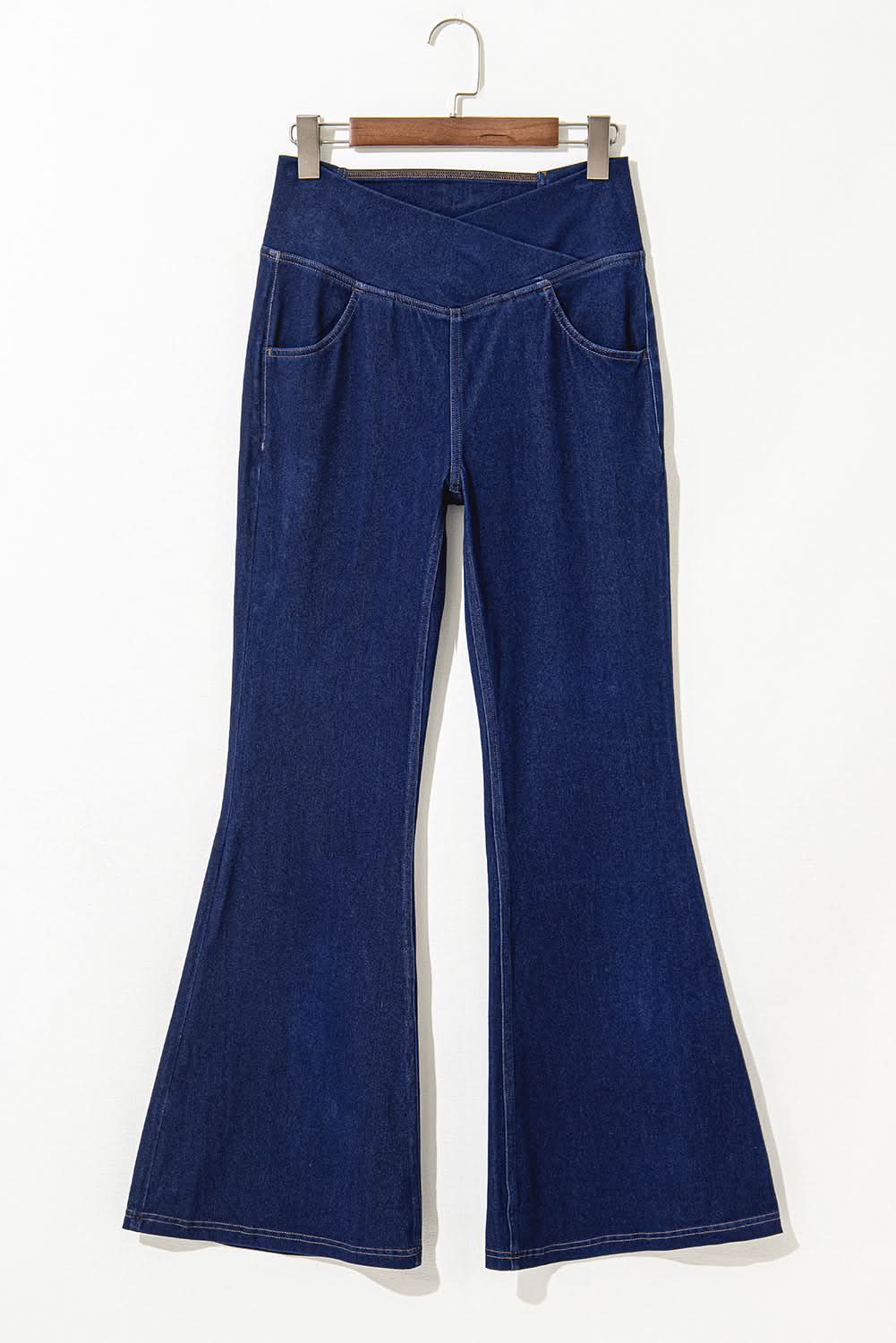 Dusk blue flare jeans with crossed waist