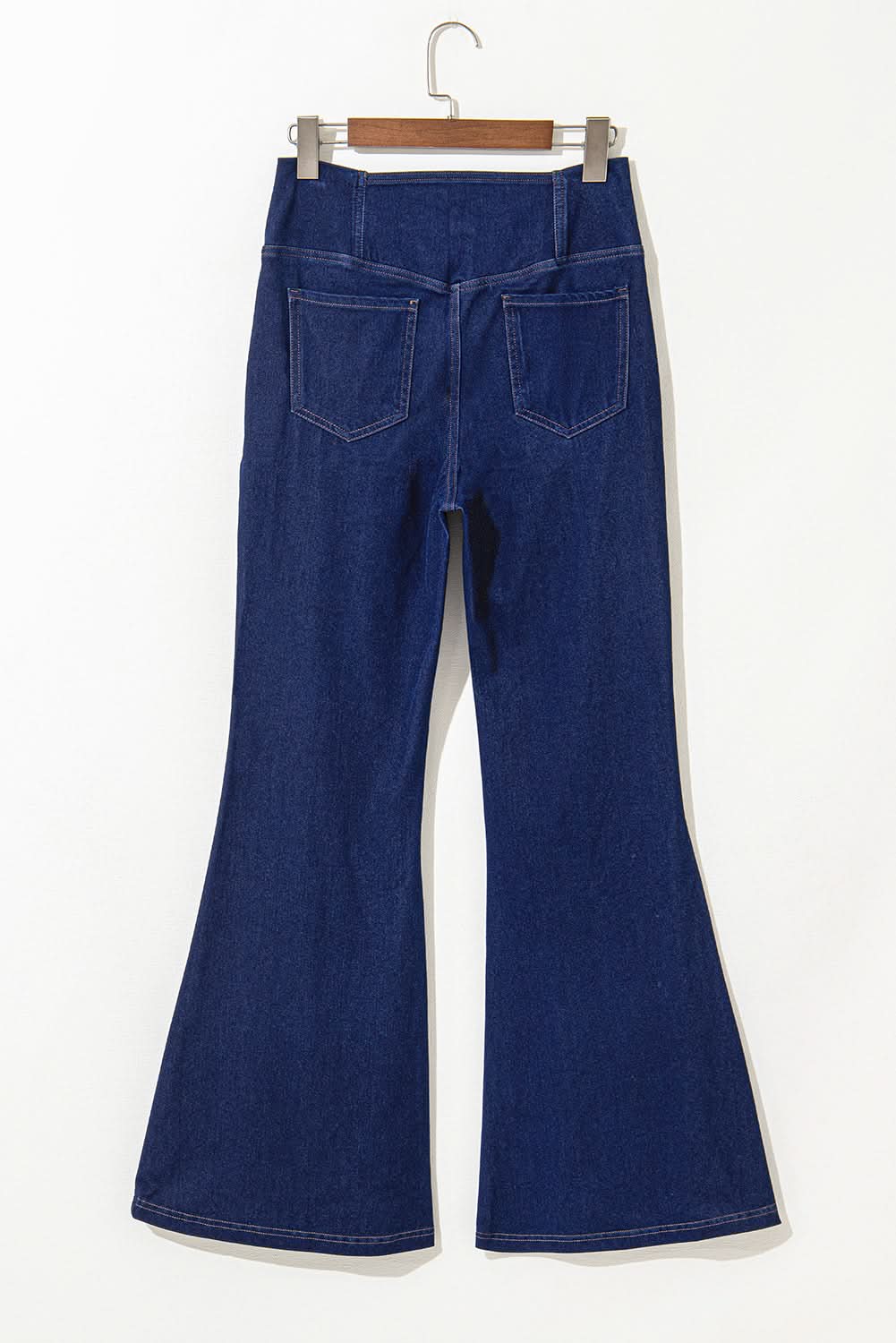 Dusk blue flare jeans with crossed waist