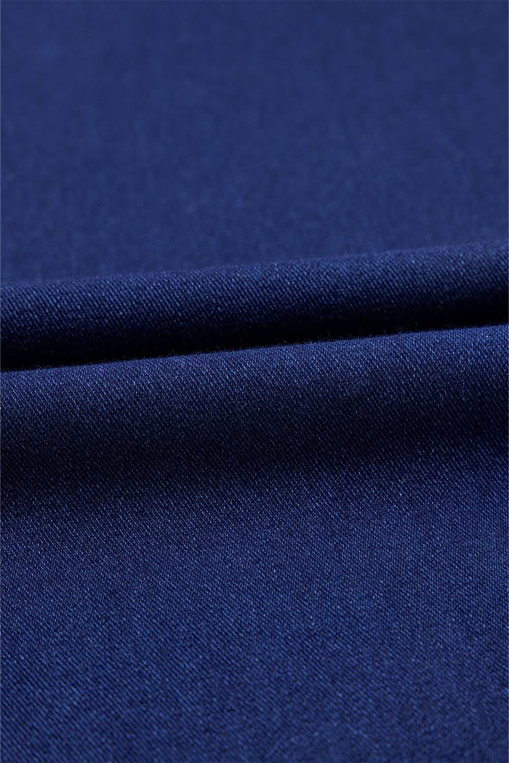 Dusk blue flare jeans with crossed waist