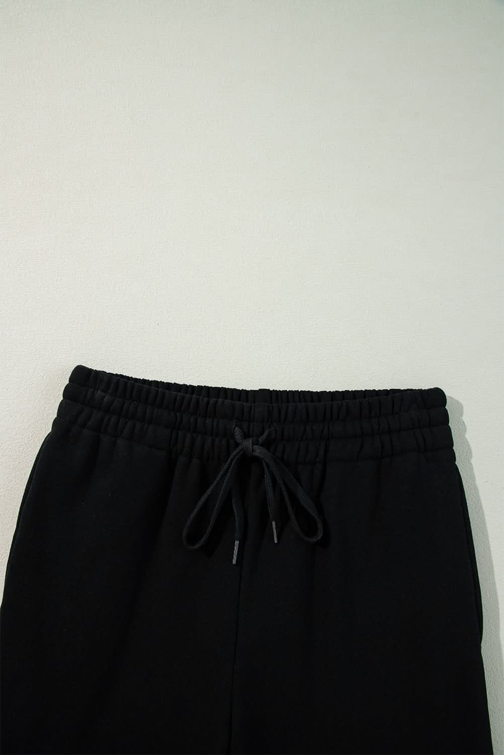 Cozy black fleece pants with drawstring