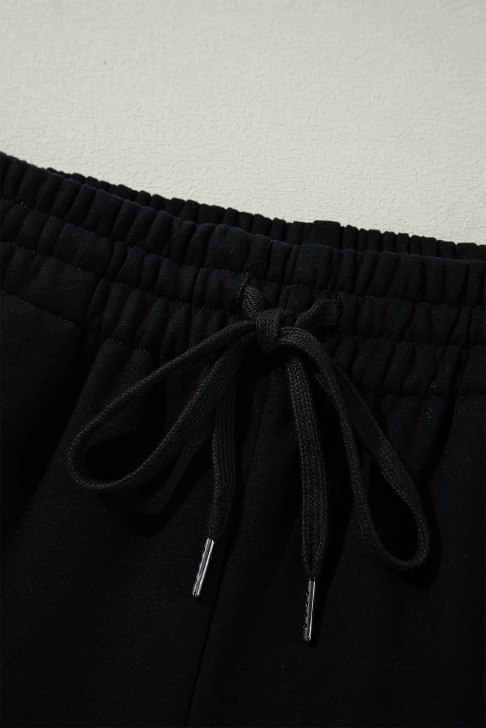 Cozy black fleece pants with drawstring