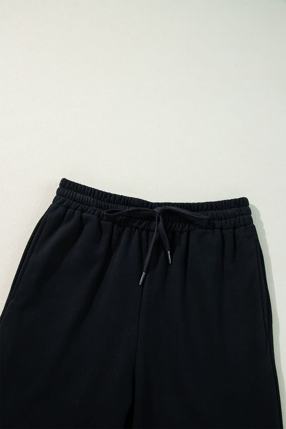Cozy black fleece pants with drawstring