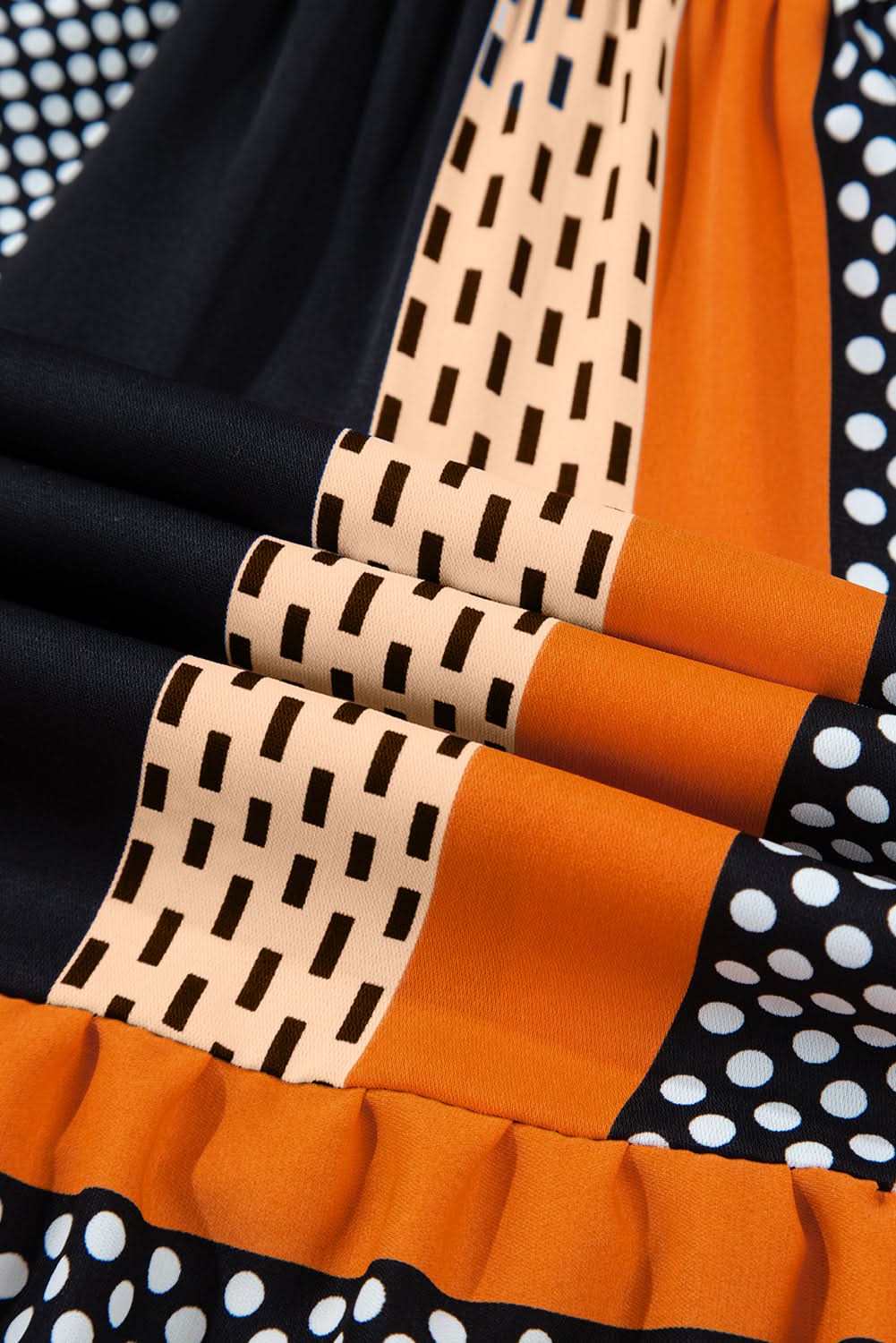 Playful polka dot ruffled mini dress