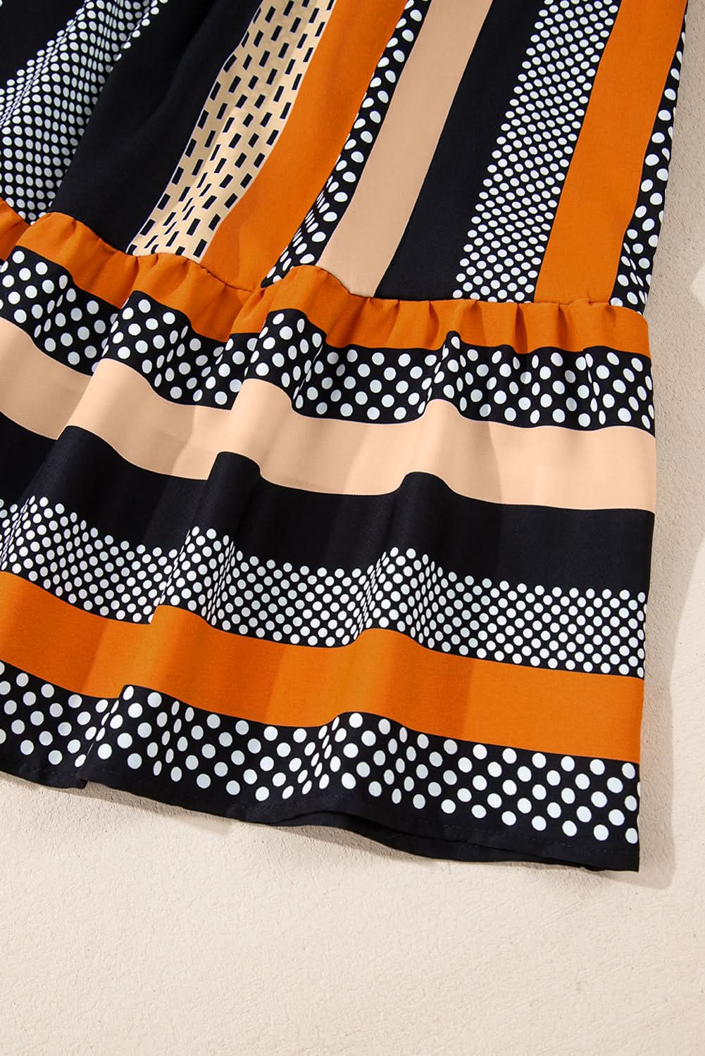 Playful polka dot ruffled mini dress