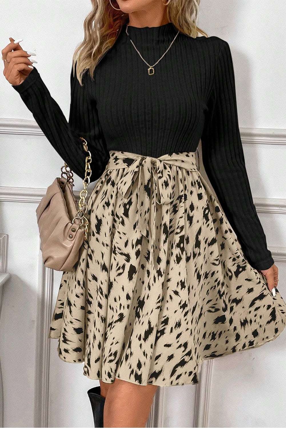 Chic black belted A-line dress