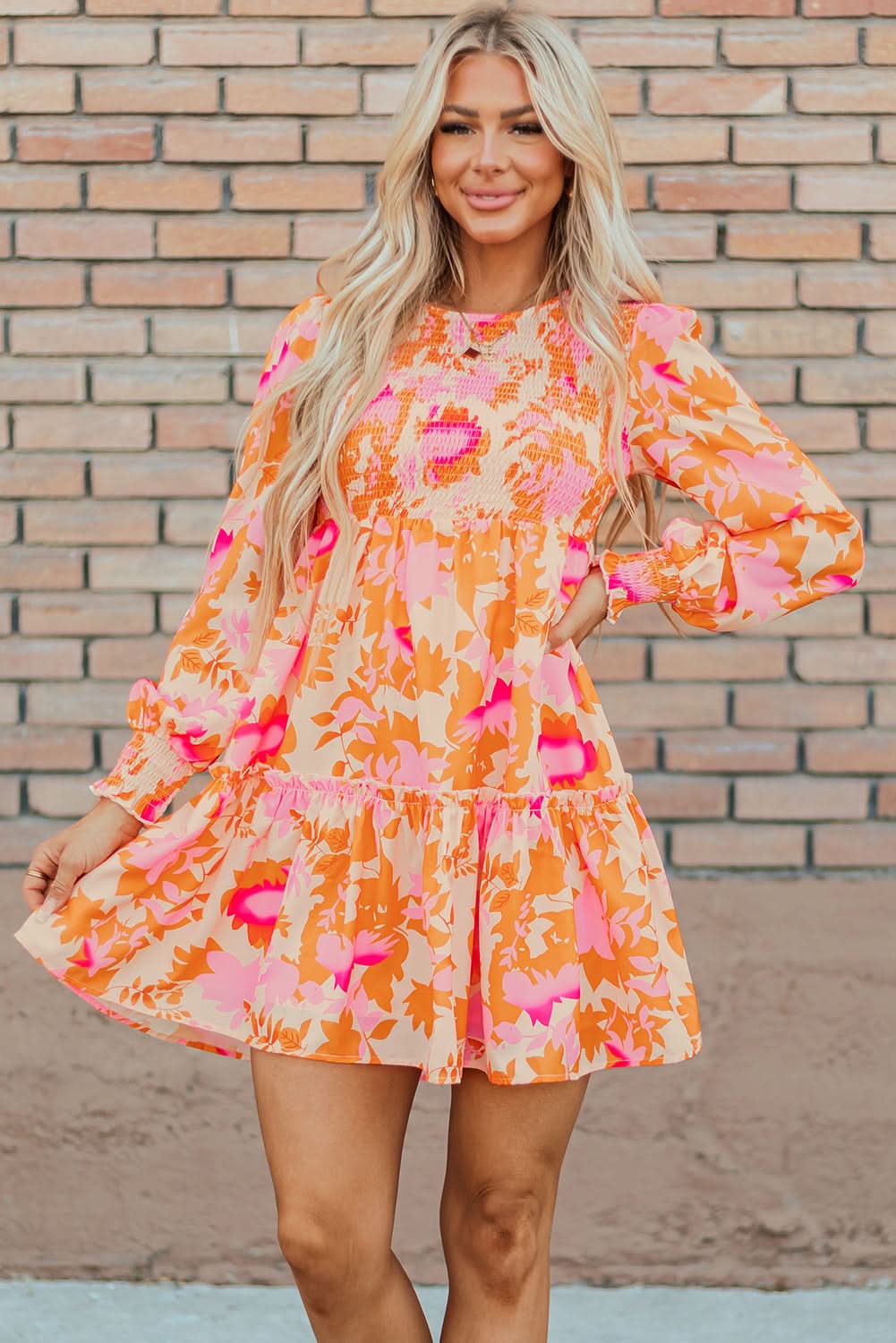 Orange smocked mini dress