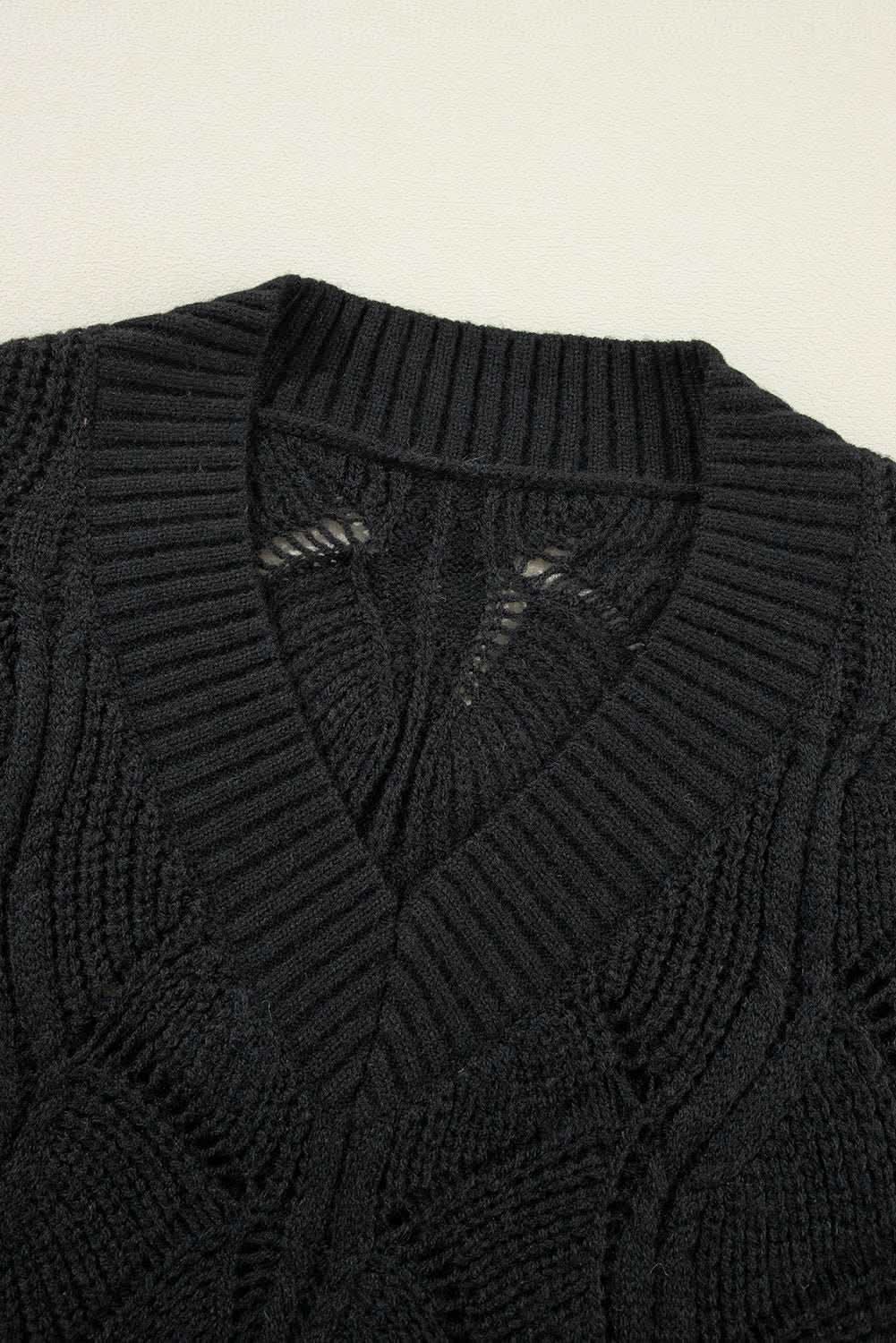 Chic black hollow knit v-neck sweater